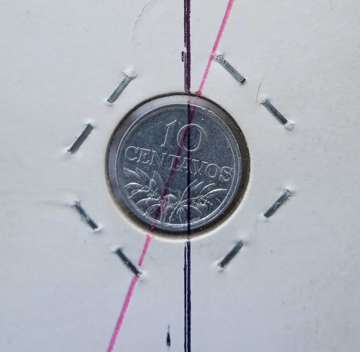 10 Centavos de 1975 - Eixo Deslocado