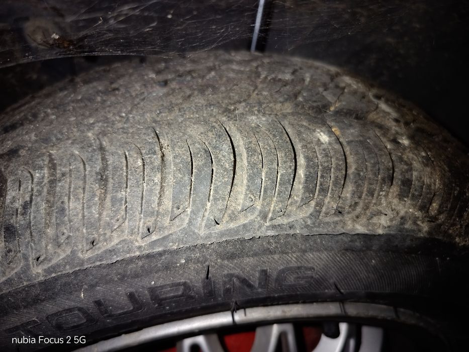 4 jantes 4x100 com peneus a meio rasto de Opel Corsa A medida 165.65.14