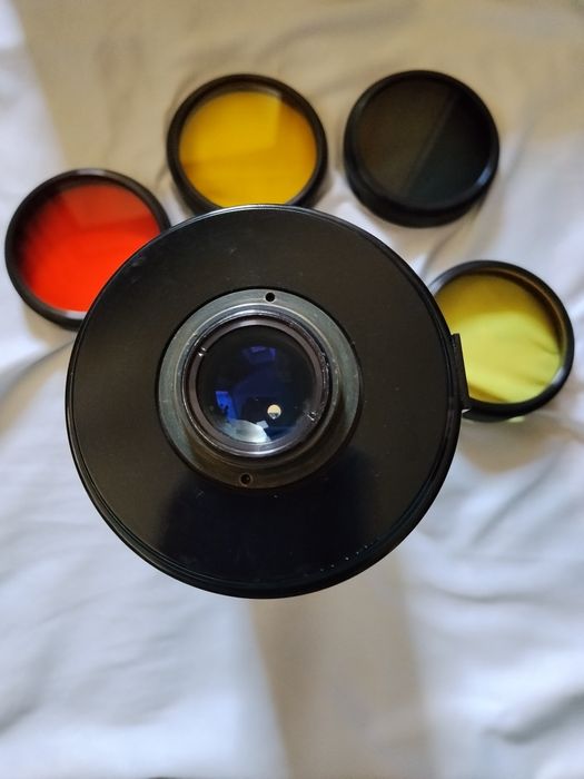 Фотооб'єктив 70 мм