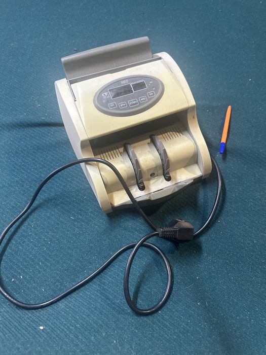 Машинка для рахування гривні