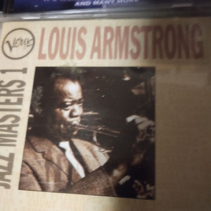 4 płyty CD  Louis Armstrong,Miles Davis,