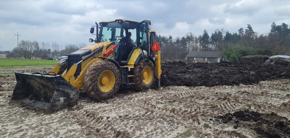 Usługi Koparko ładowarką Cat