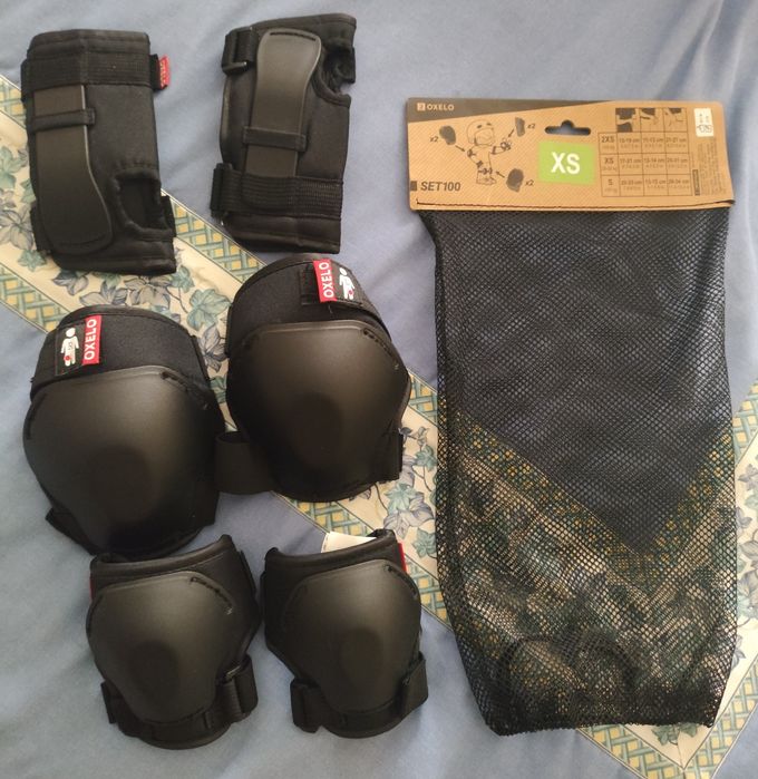 Conjunto proteções Oxelo pretas tamanho XS