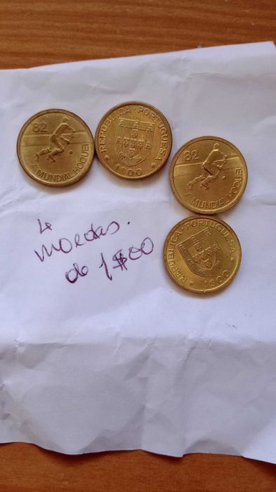 Moedas de um escudo.