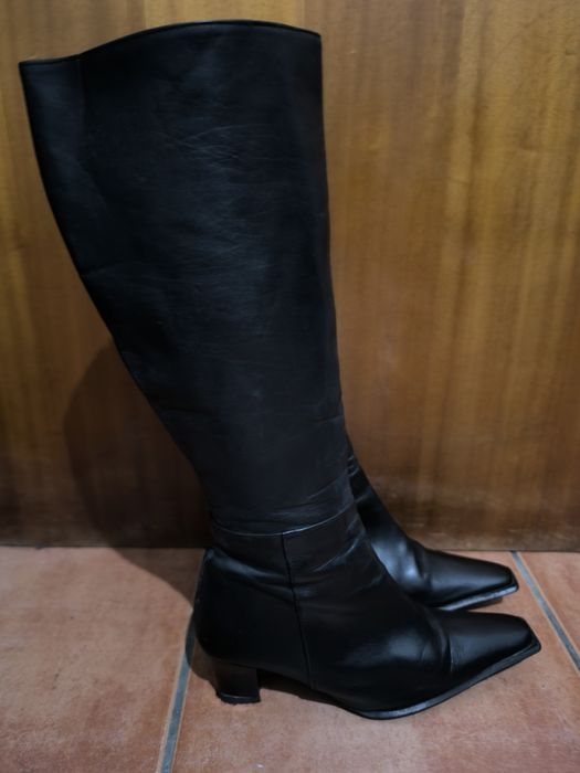 Botas pretas de cano alto