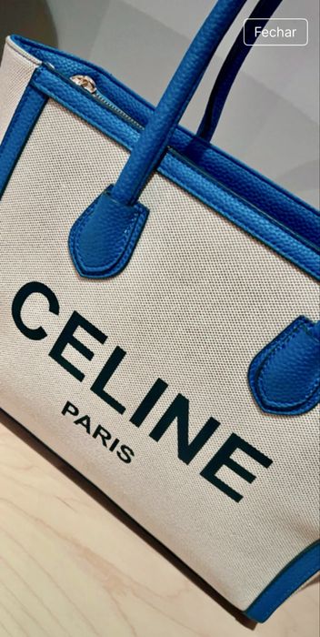 Carteira de lona em cor de ateia e azulão