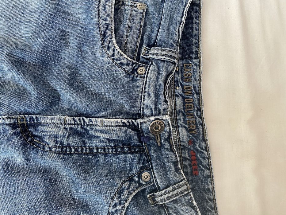 szerokie spodnie baggy jeansy niebieskie y2k affliction