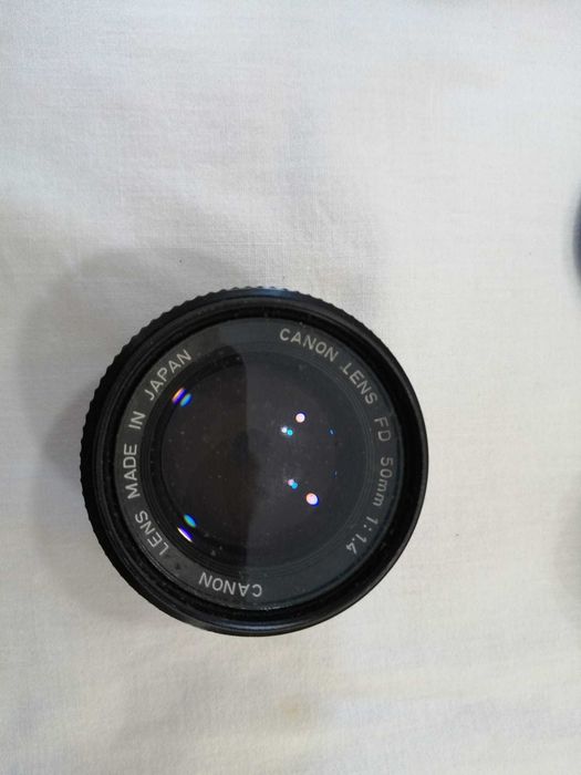 Canon AE-1 (with additional items)64586286021123121