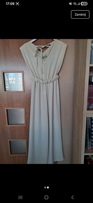 Jasnobezowy kombinezon