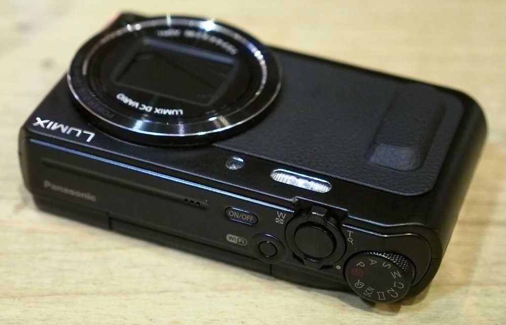 Máquina Fotográfica Bridge PANASONIC Lumix DMC-TZ57 - Troco por instrumento musical ou algo do meu interesse. (como nova, com pouco uso)
