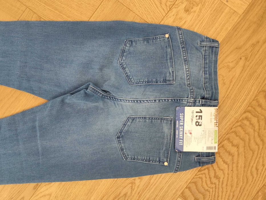 Nowe jeansy dziewczęce skinny fit 158 niebieskie