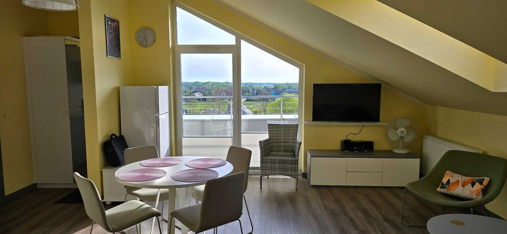 Nowoczesny apartament z  widokiem na morze i basenem.