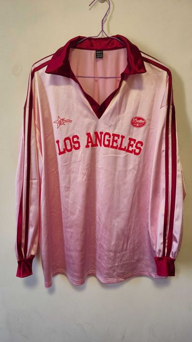 Жіноче рожеве поло