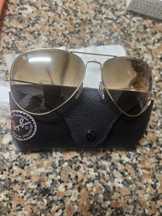 Óculos ray ban dourado