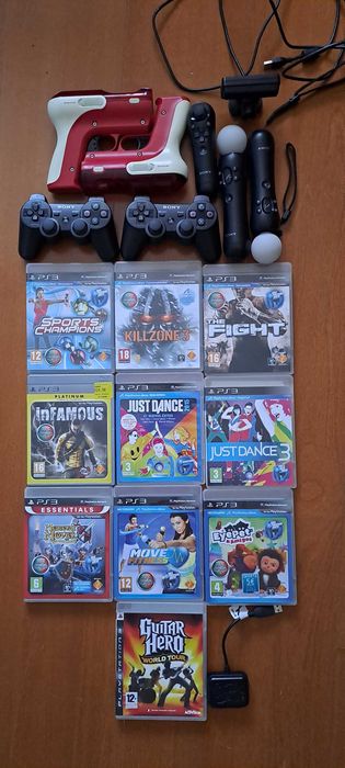 PS3 com jogos, comandos e câmara