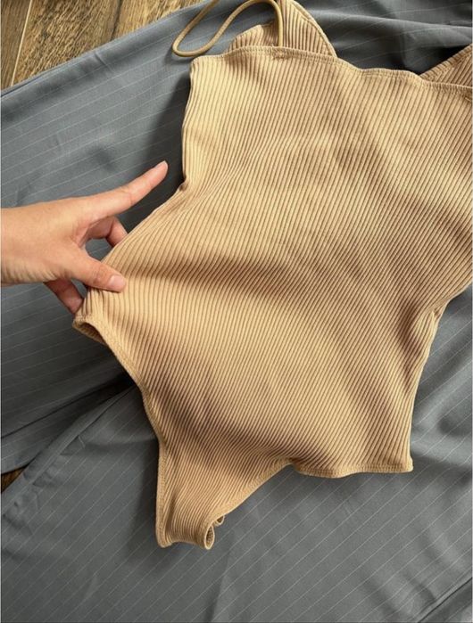 Бавовняне бежеве боді в рубчик