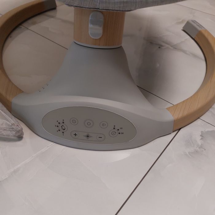 Заколисуючий центр гойдалка