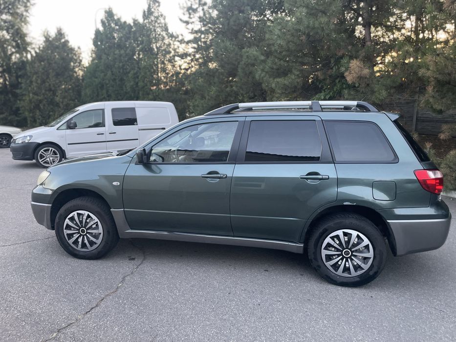 Outlander 2.0 бензин