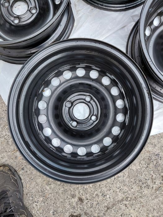Диски 4 100 14 Opel J5,5  ET 39  DIA 56,6 ; 3000 грн.за 4 шт..