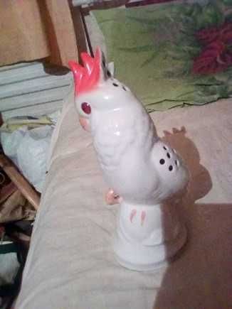 Продам статуэтку попугая