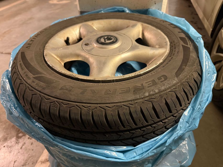 Felgi aluminiowe 13" Skoda Felicia + Opony letnie + Śruby