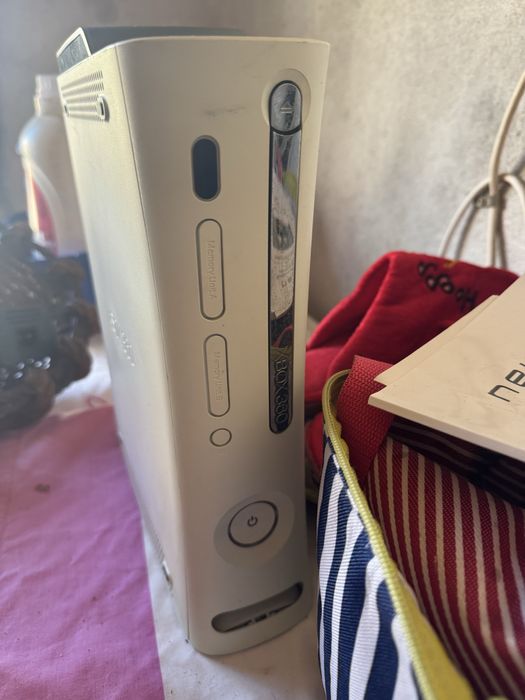 Xbox 360 usada com carregador
