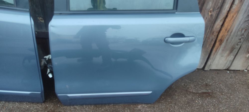 Nissan Note E11 drzwi lewe prawe przód lub tył B52G