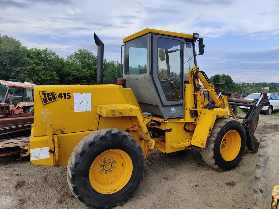 JCB Ładowarka Kołowa Przegubowa JCB 415 z Chwytakiem Hydraulicznym Chwytak  Ładowarka Kołowa Przegubowa JCB 415 z Chwytakiem Hydraulicznym Chwytak