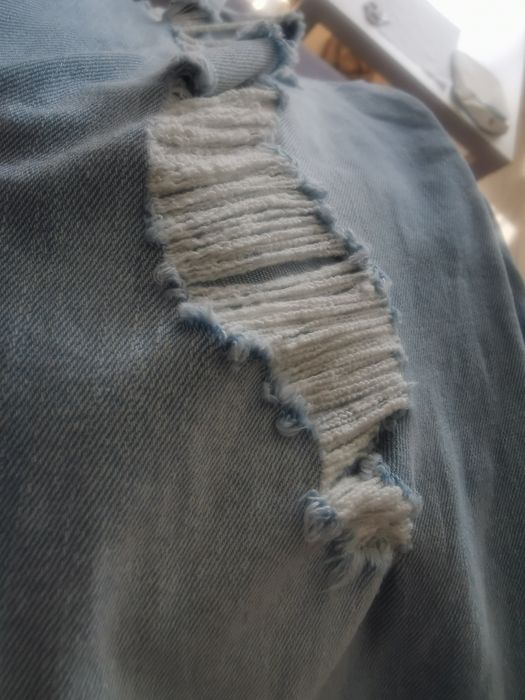 Spodnie ciążowe z dziurami  Bonprix