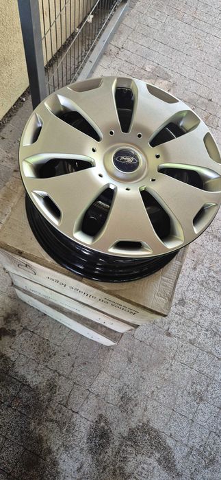 Felgi oryginalne Ford z kolpakami 16 4x108 Nowe cena za kpl