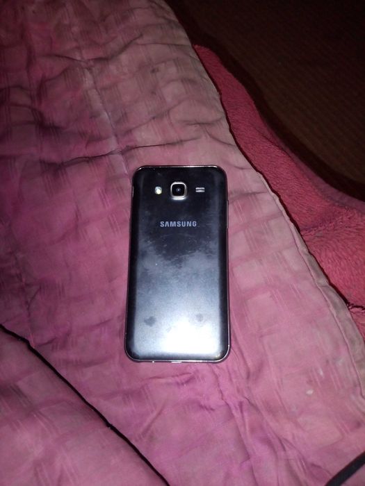Продам сенсорный телефон самсунг
