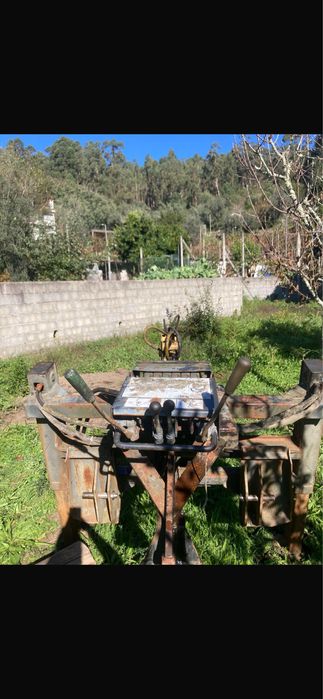 Braço retro para trator