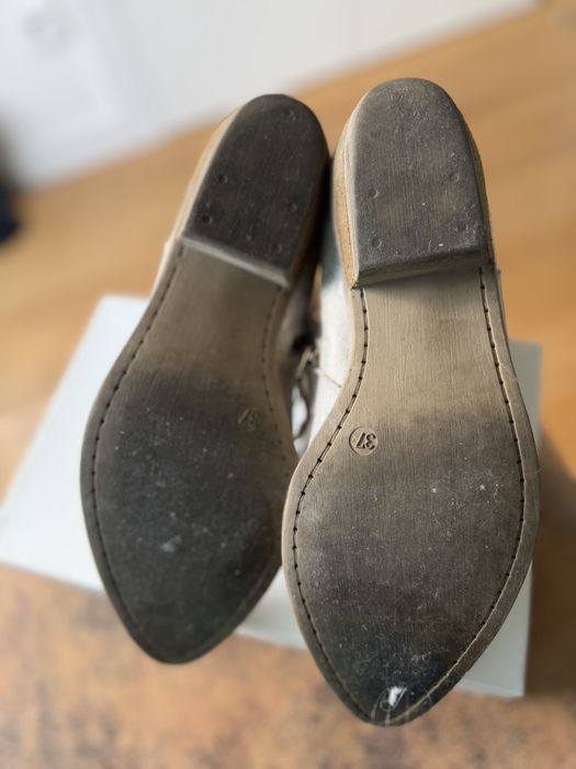 Botins ouvie em pele e couro