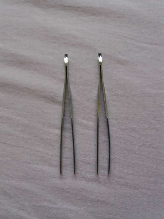 Cena za wszystko 2 pęsety kosmetyczne Donegal