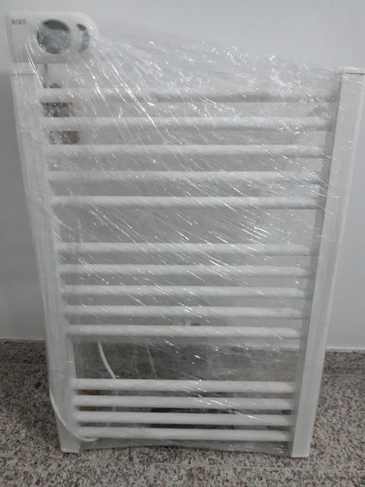 Pratico e útil Toalheiro Eléctrico