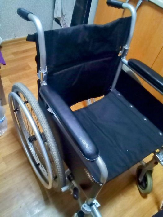 Инвалидная коляска