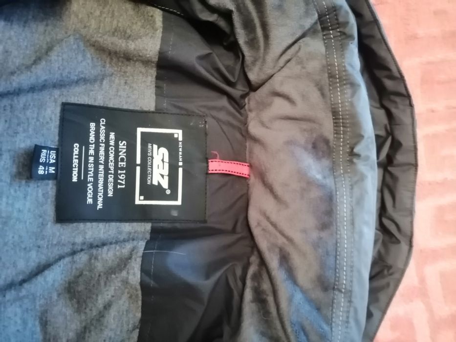 Продам мужскую куртку б/у в отличном состоянии на 52 размер.