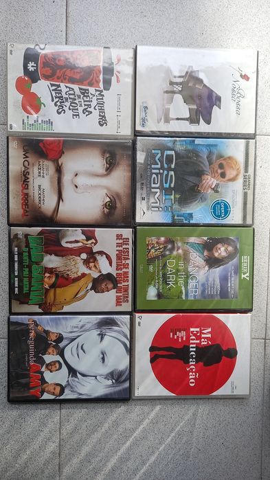 Various DVDs with multiple movies.64741305919491122