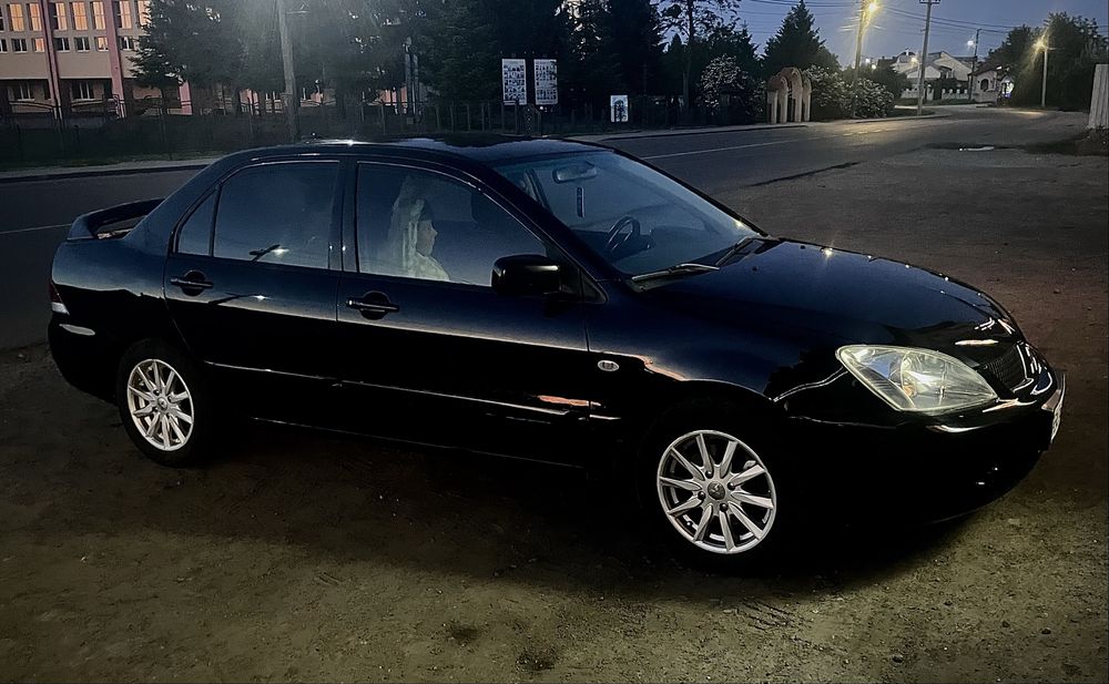 Продаю Mitsubishi Lancer 9 1.6 газ/бензин 2009