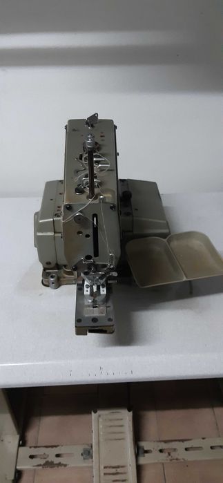 Máquina pregar botões