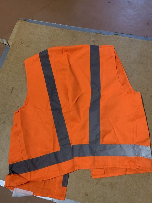 Жилет захисний отражаючий.