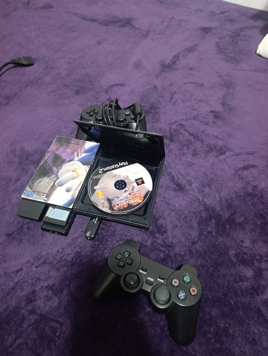 PS2 com jogos em perfeito estado