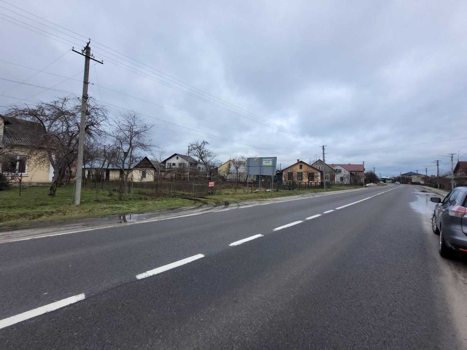 Дерев'яний будинок та земельна ділянка 14 сот. м. Кам'янка-Бузька