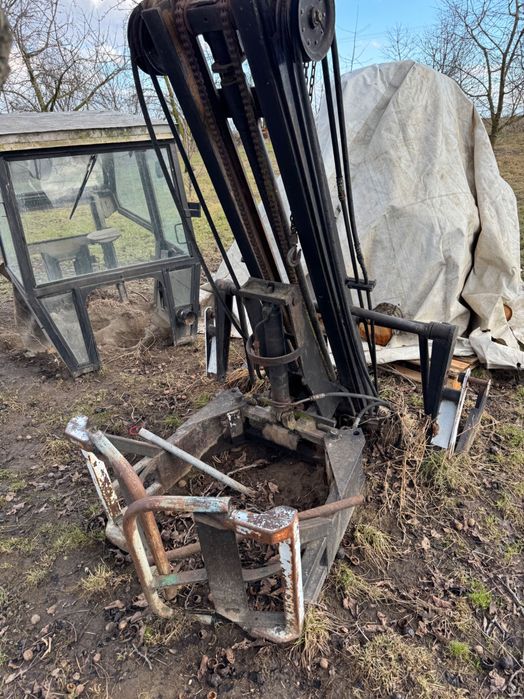 Maszt z chwytakiem do bel