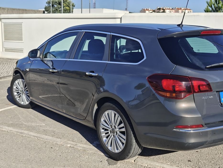 Opel Astra Aporte Tourer 2013 — photo 3