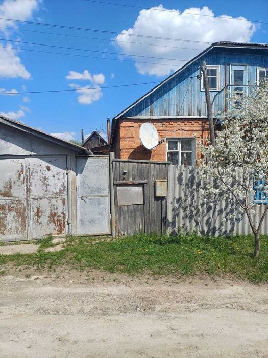 Продам 1/2 будинка в м.Богодухові
