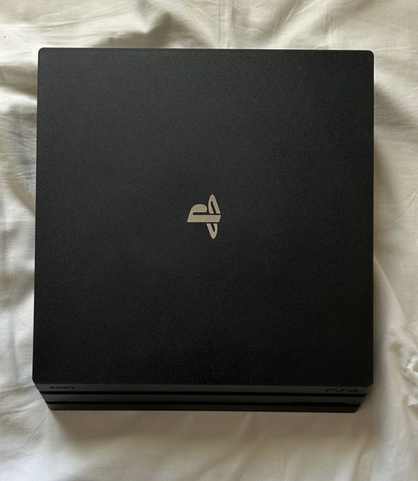 PlayStation 4 Pro Modelo 4K)+ Comando Original Branco + Cabo Alimentação