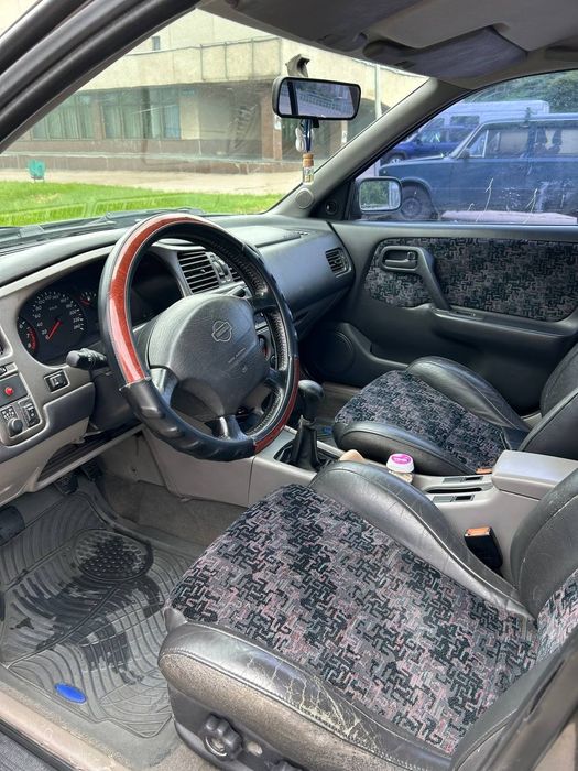 Нісан примера r11