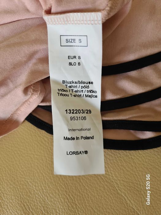 Bluzka krótki rękaw bladoróżowa ORSAY dekolt "woda"