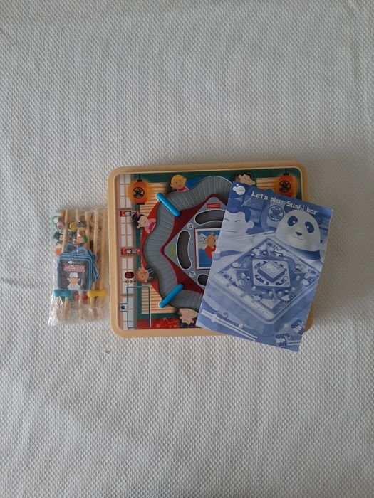 Jogo com peças de sushi